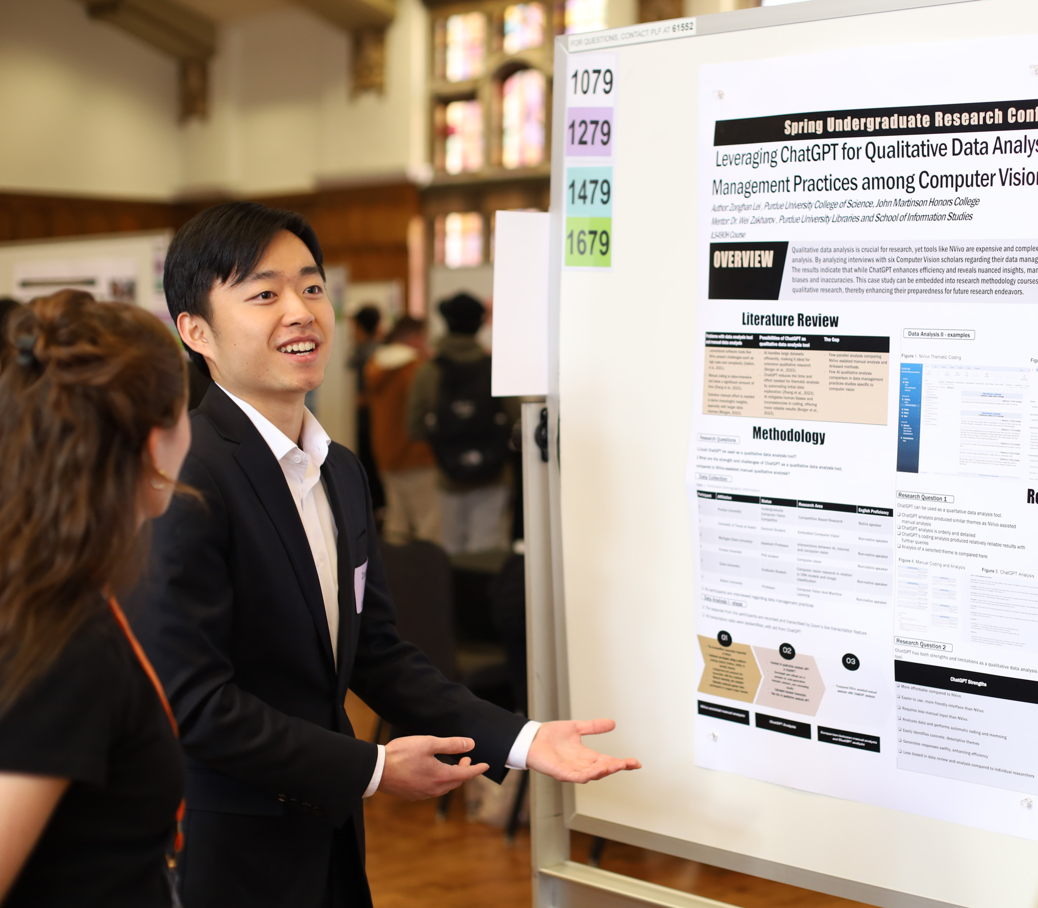 A student presenting a poster at a research conference